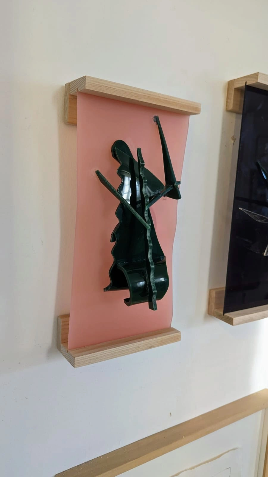 An artwork framed on a wall