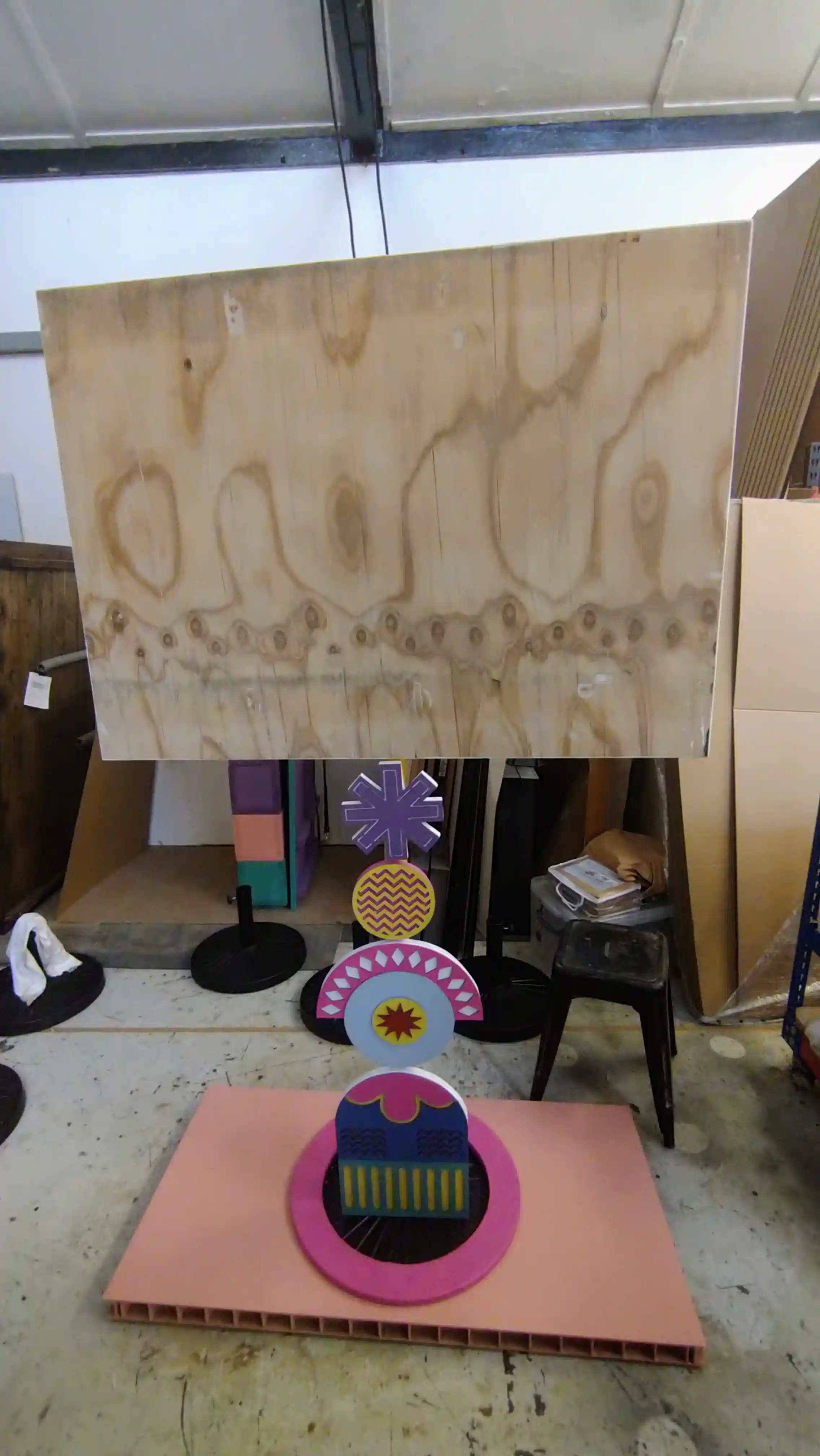 The intricate designs and colours fully assembled together, apart from the top board which is bare wood.