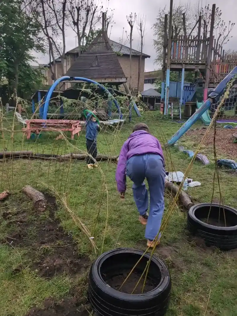 Recycled tyres used as part of the willow tunnel's base at Pearson Street Adventure Playground